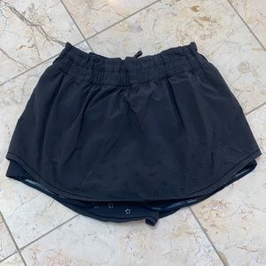 Lululemon size 6 black skort with flower cutouts